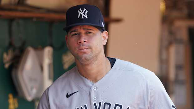 Yankees C Gary Sanchez walking in dugout